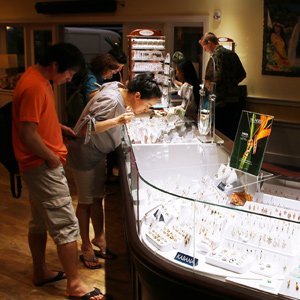 Red Raider for Life gear (top), handcrafted shell lei (middle) and Na Hoku fine jewelry in the Hapa Home Store (below) are just a few of the many shopping options at the Hukilau Marketplace.