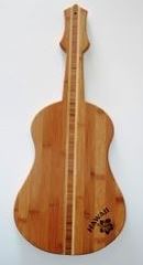 Dice delicious poke on a Bamboo Ukulele Cutting Board $34