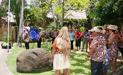 Cook Islanders raise their flag July 17, 2017 at the Polynesian Cultural Center Cook Islanders raise their flag, sing national anthem at PCC