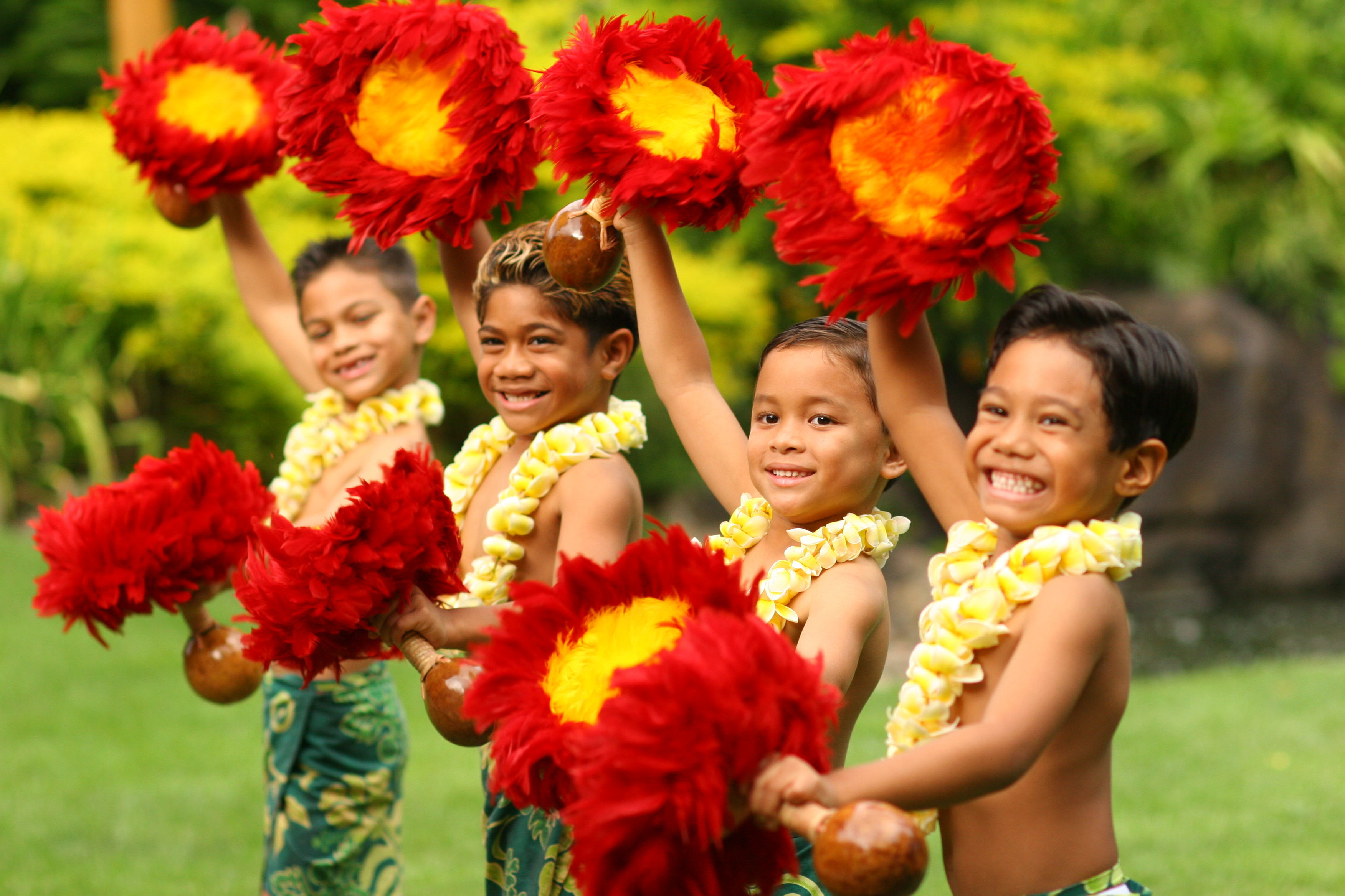 photo of four keiki boys dancing
