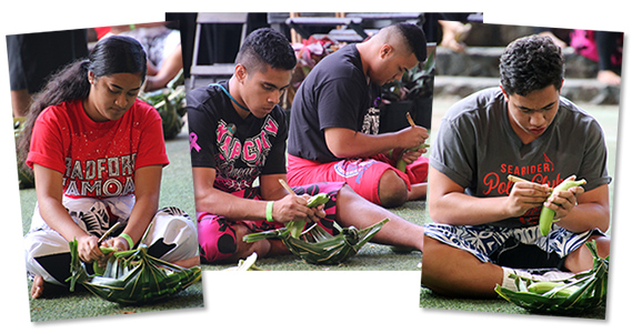 High school students peel green bananas in the traditional way.