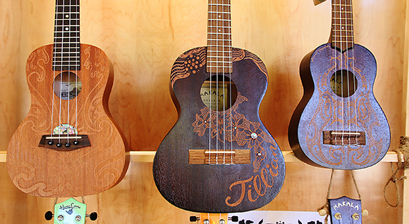 Hand-etched ukuleles in the PCC Kauhola Art Gallery