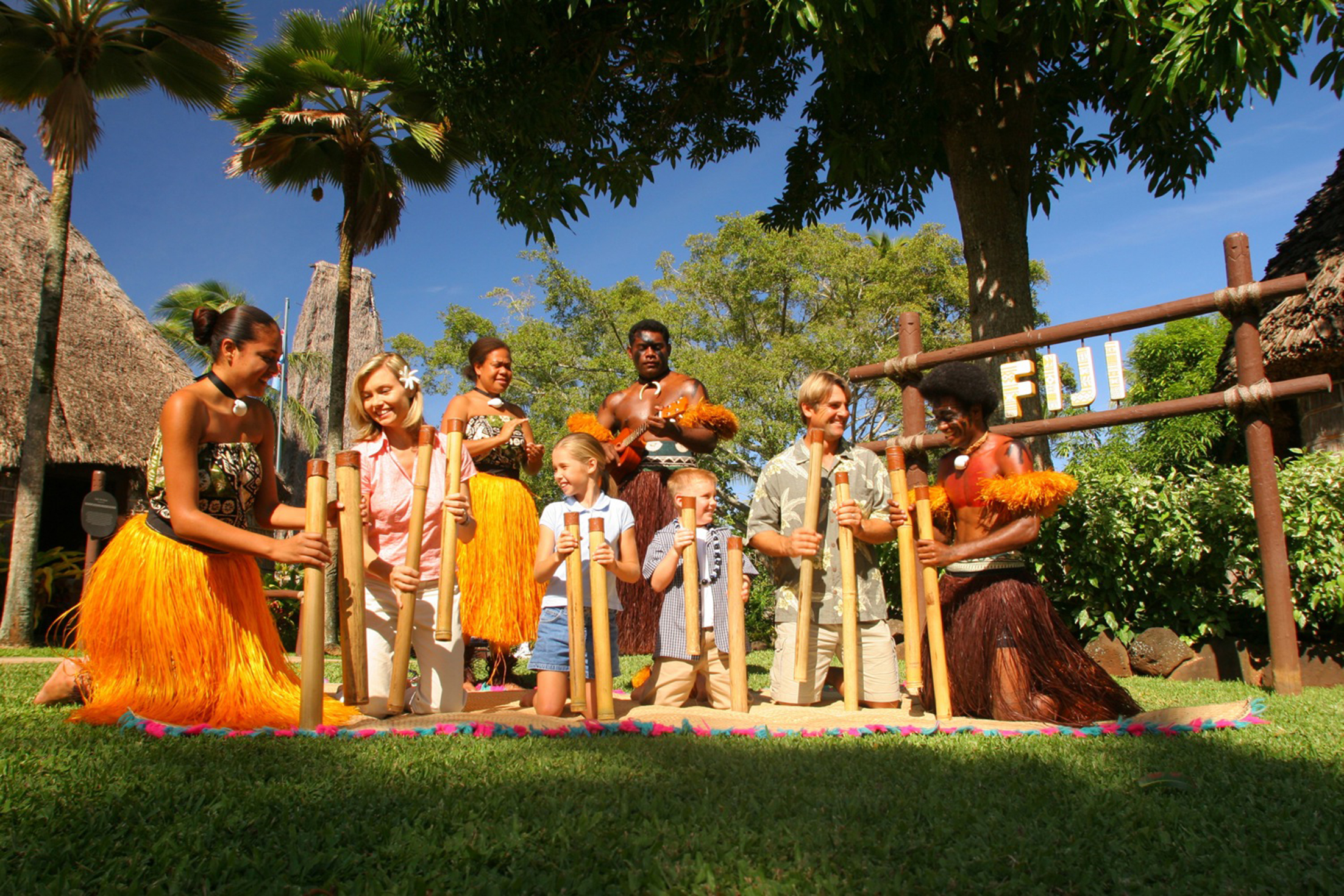 Fijian Villagers teach their traditional drum, Derua.