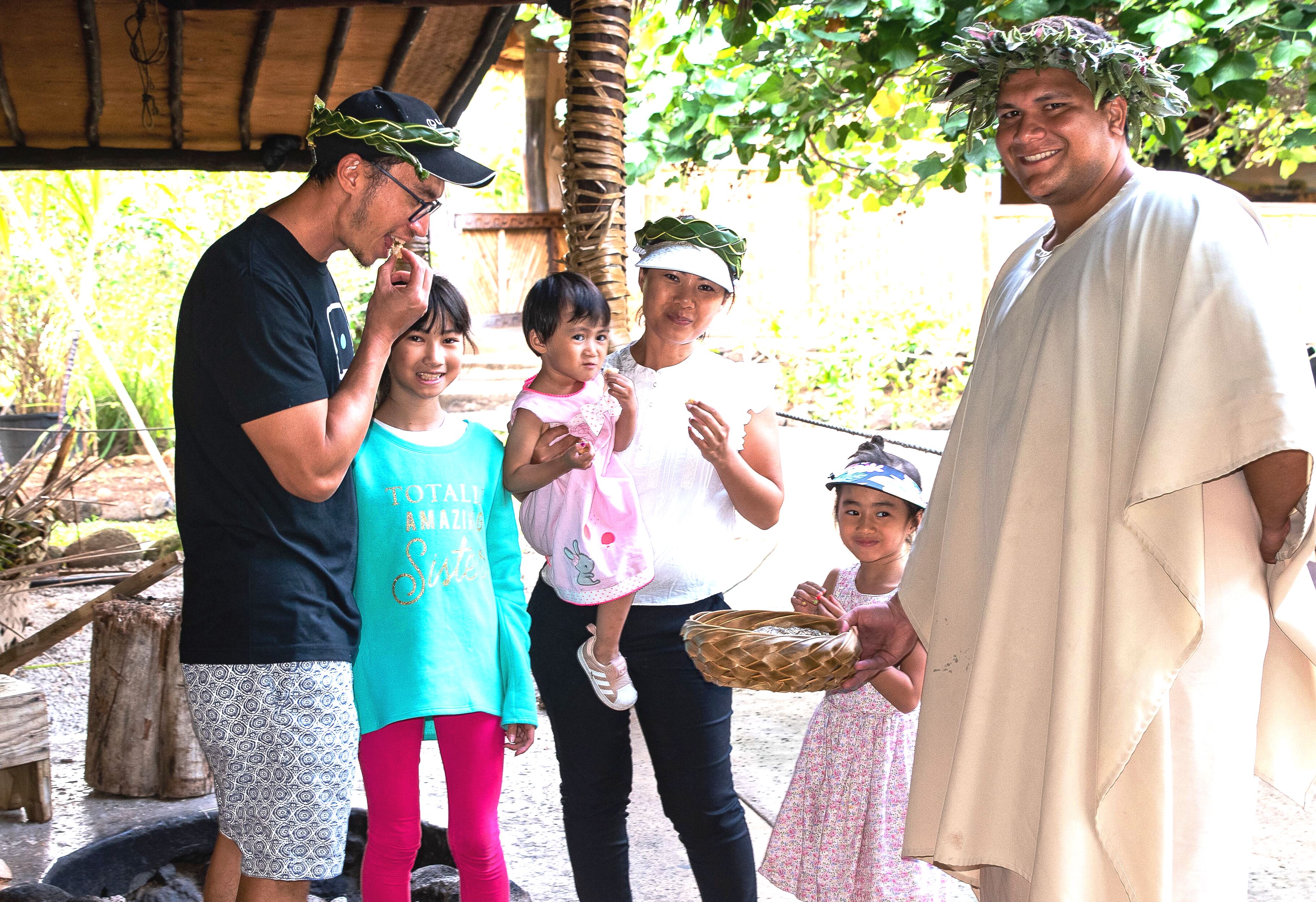 Photo of family sampling Tahitian coconut bread
