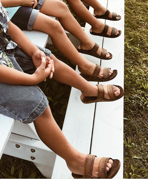 Children wearing J-slips, one of the most popular styles of local Hawaiian footwear.