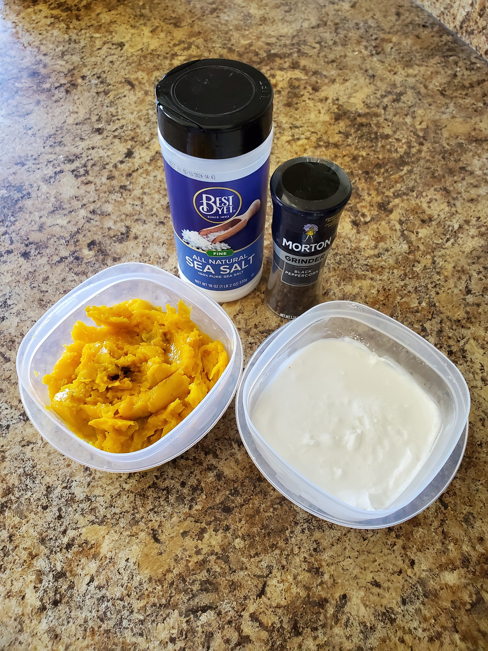Picture of cooked pumpkin, salt, pepper and coconut milk