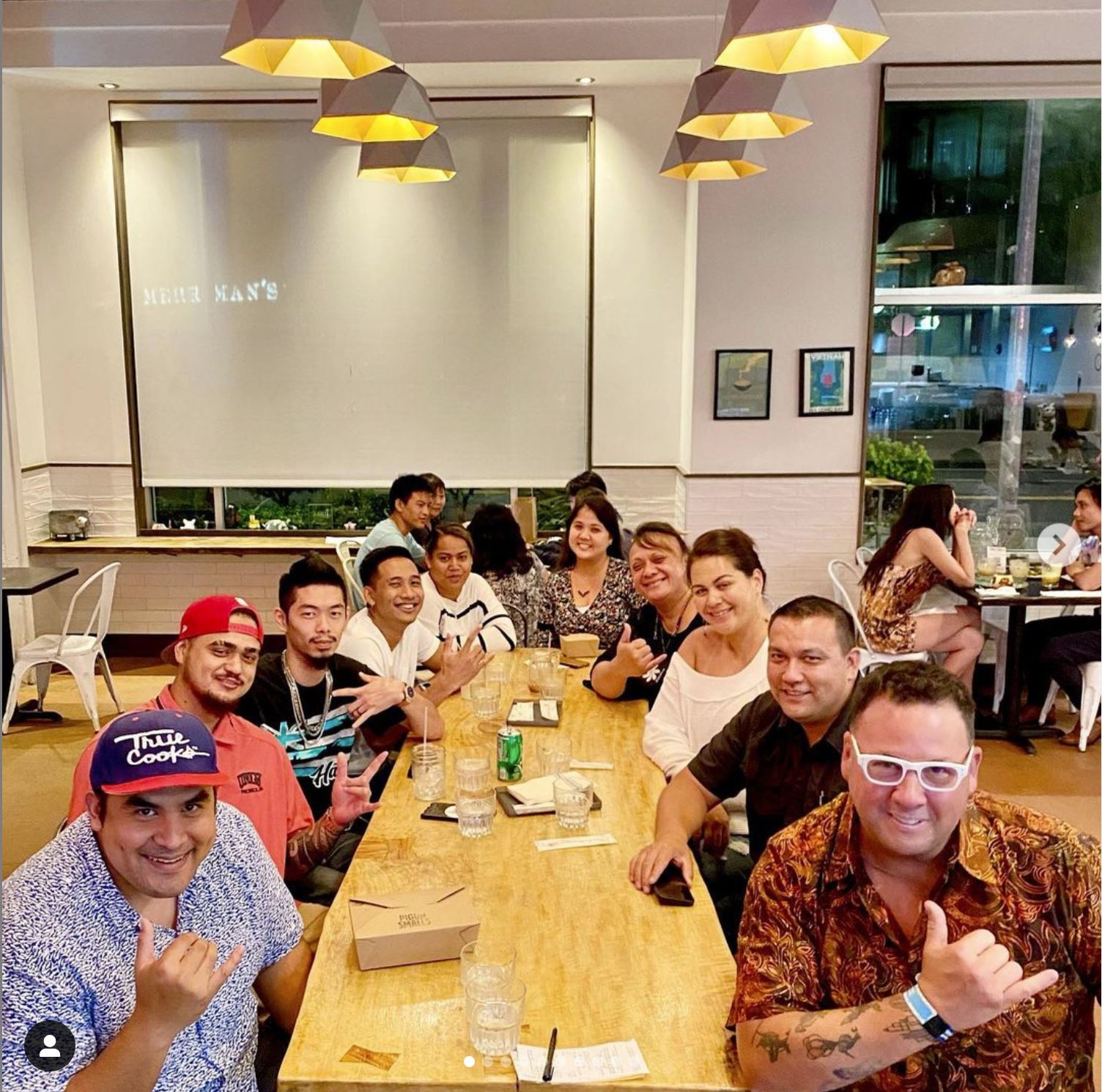 Image of 10 members of Pounders Restaurant management team meet to begin planning changes and upgrades to the restaurant