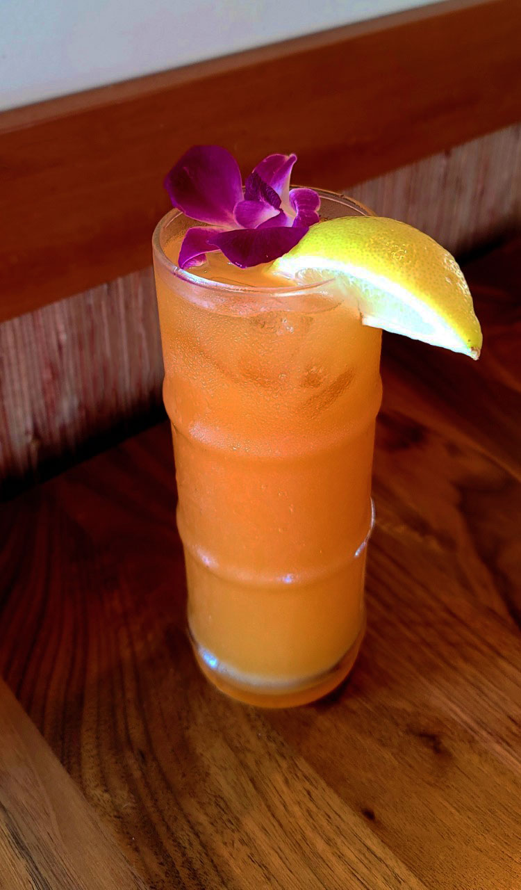 photo of a glass of Pineapple Orange and Guava juice
