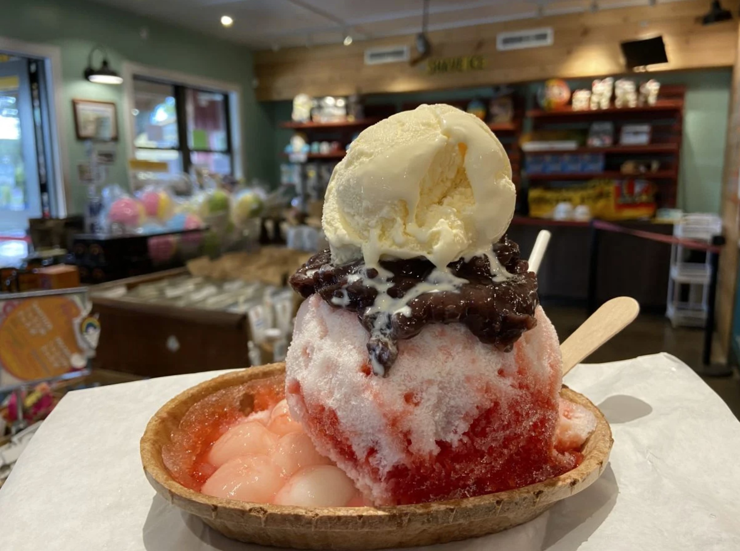 photo of dessert called shaved ice topped with condensed milk, beans and ice cream