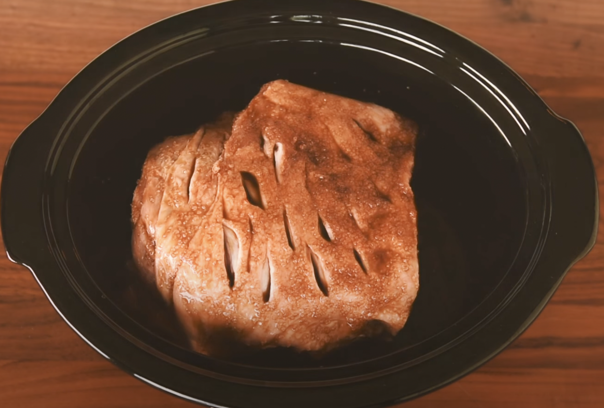 final photo of pork butt after prep and seasoned in a slow cooker