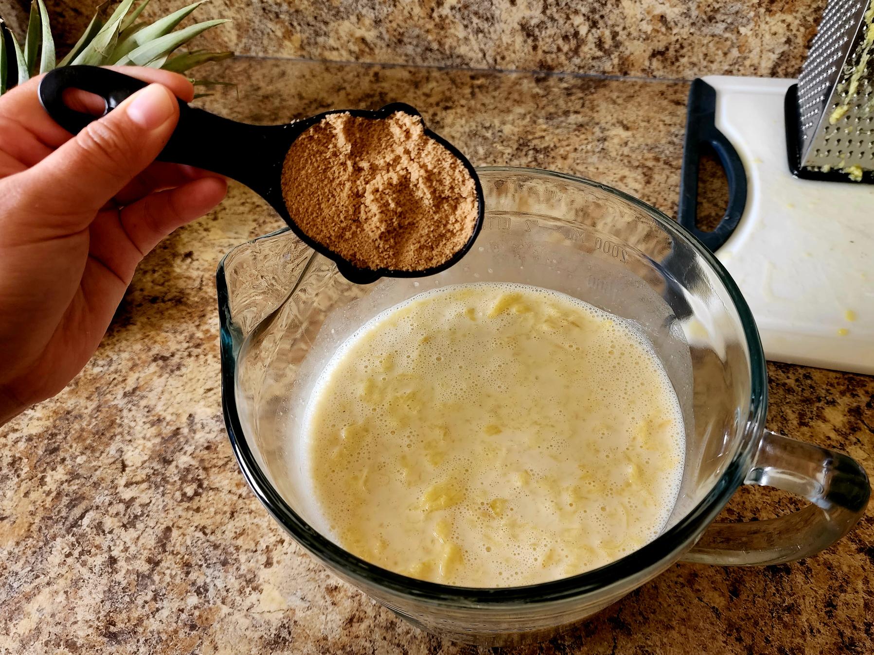 photo of a 1/2 cup of sugar added to the mixture. The vaifala is almost ready. 
