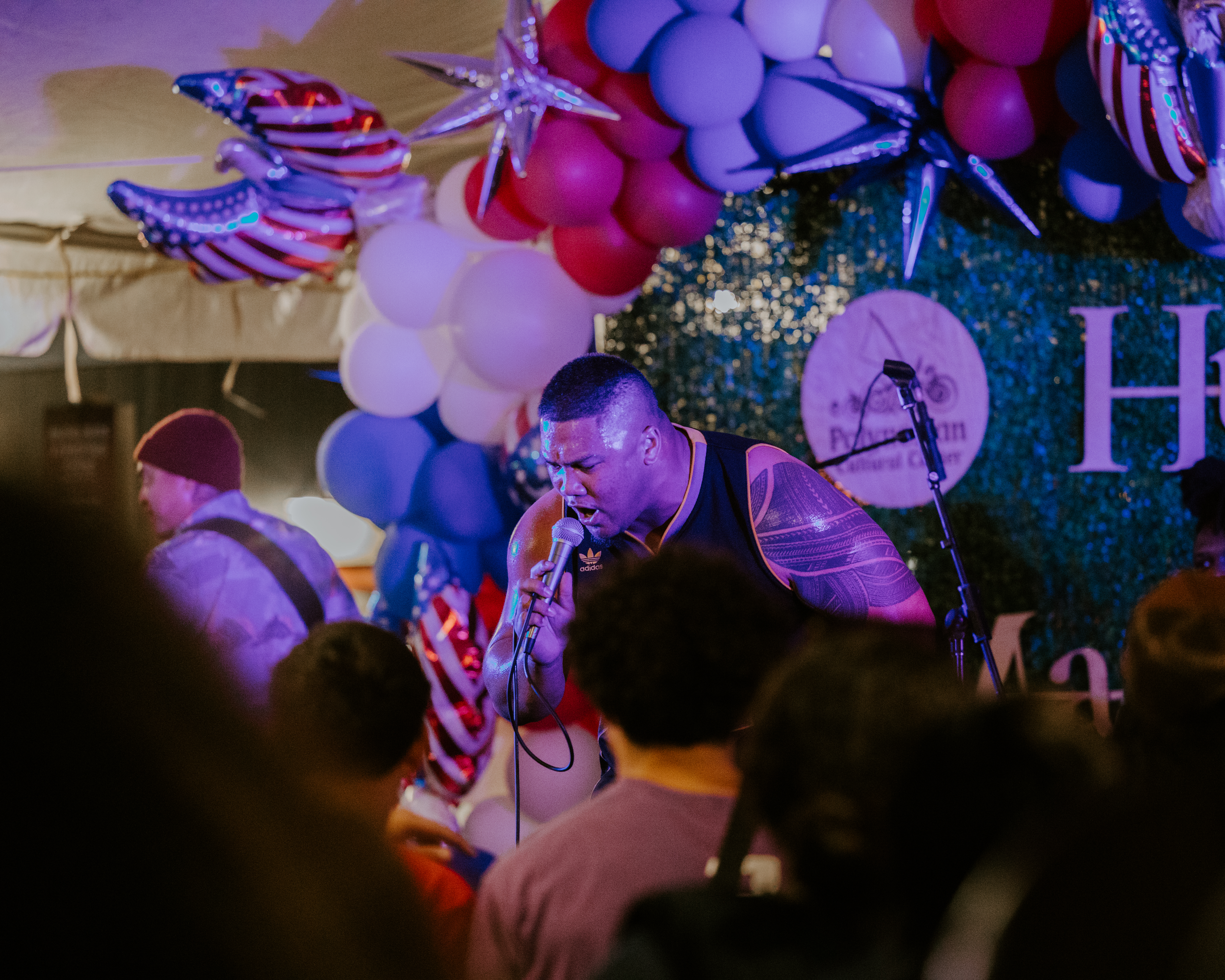 photo of Johnny Suite, local Hawaiian singer performed in the 4th of July concert at Hukilau Marketplace. 