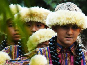 image of 4 young boys dress up in traditional Hawaiian wear