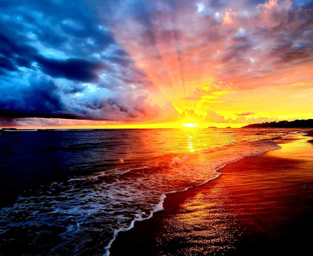 sunrise on hukilau by Nina Jones