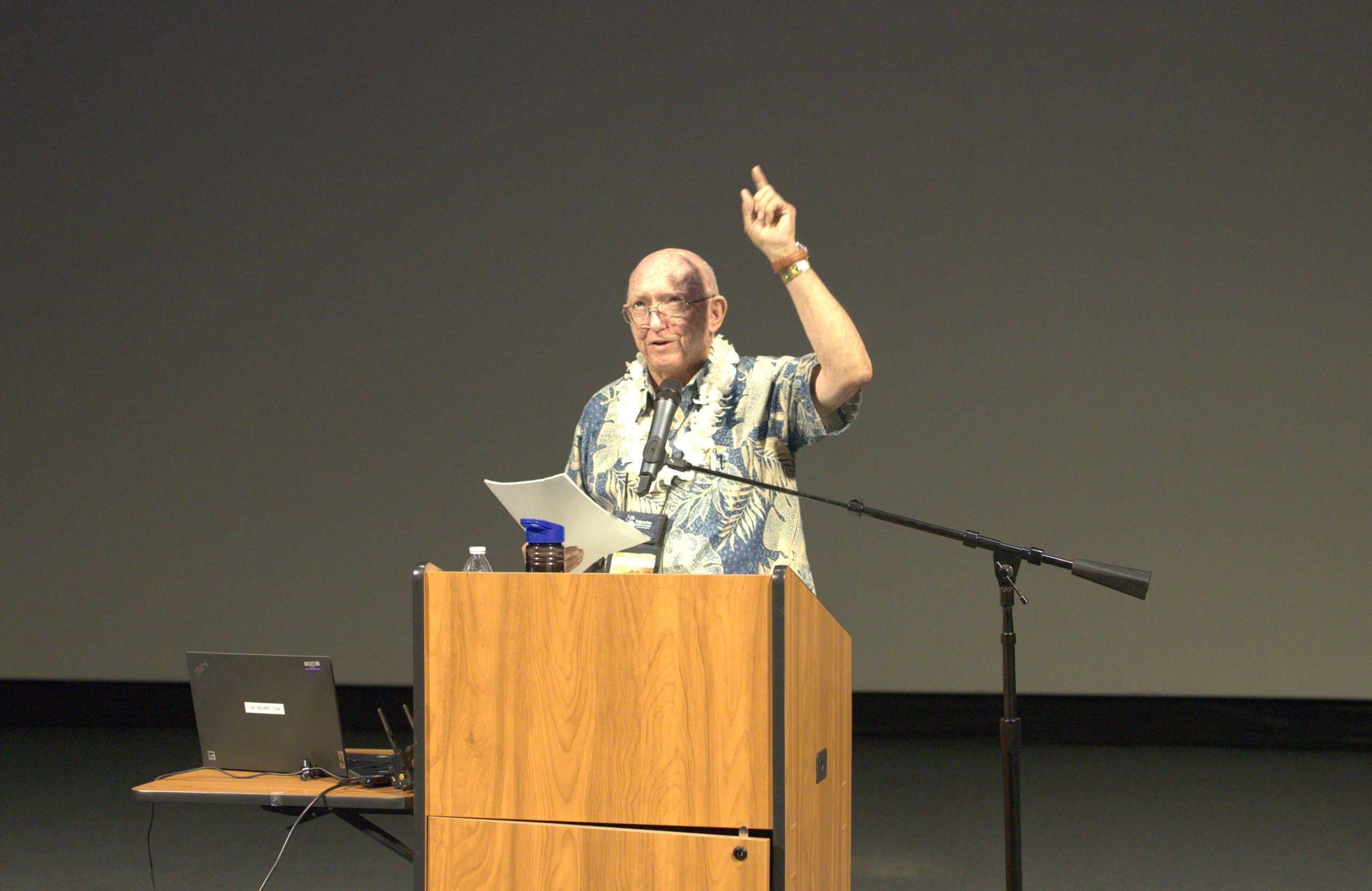 Lanny Britsch standing at pulpit