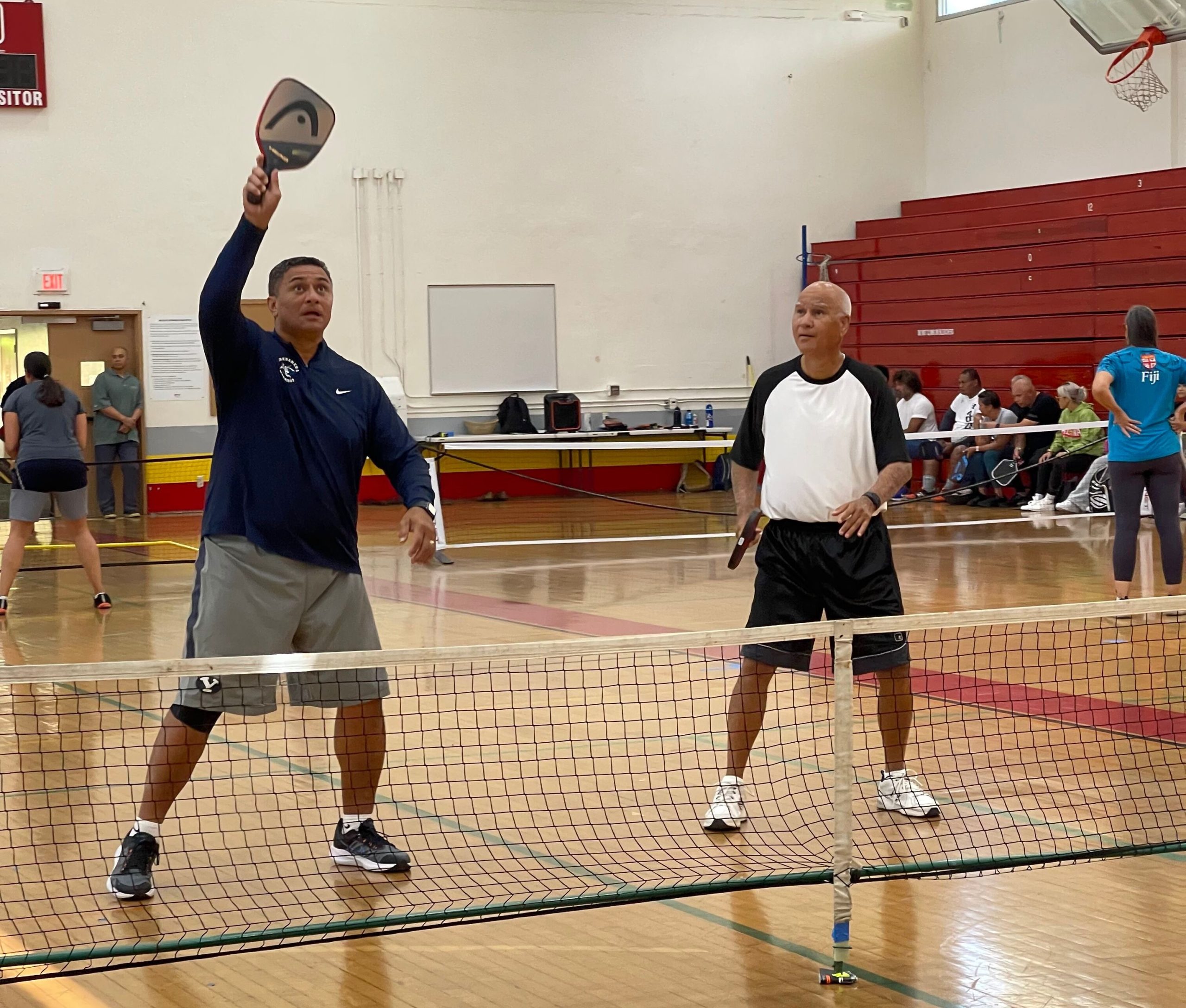 Men playing pickleball
