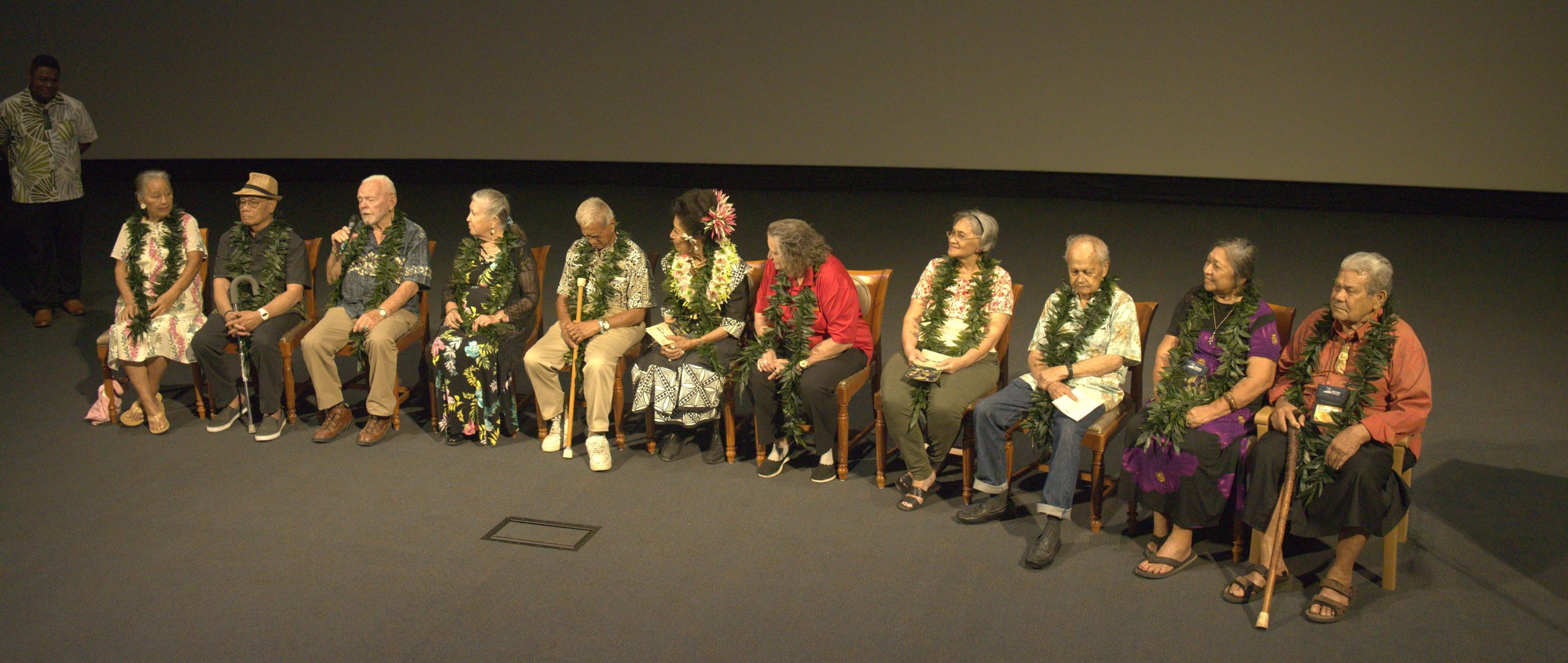 Group of Service Missionaries on stage.